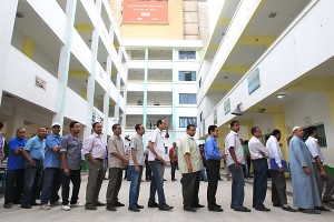Voters waiting in line to cast their ballots for the presidential elections (AFP)