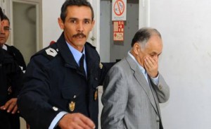 Former Libyan prime minister Baghdadi al-Mahmoudi (R) was arrested in Tunisia last September. (AFP)
