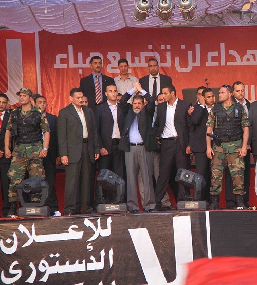 President-elect Morsi swears oath of office from atop stage in Tahrir Square. (Photo by Mohamed Omar)