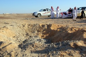 Egyptian Bedouins gather at the scene of an explosion in Sinai near the Israeli borders AFP PHOTO/STRINGER