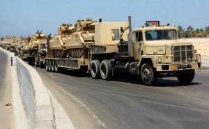 Tanks are transported into North Sinai near the border between Egypt and Gaza