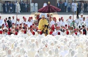 King Mohammed VI of Morocco parading on horseback at the Royal Palace in Rabat for the "Celebration of loyalty and allegiance" ceremony during whcih protesting activists were arrested by police AFP PHOTO / AZZOUZ BOUKALLOUCH