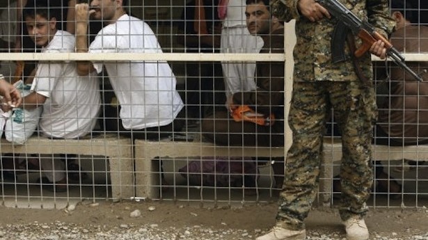 20120829_CJM_Death Penalty_CAM Prison officer guards detainees in an Iraqi prison AFP PHOTO / SABAH ARAR
