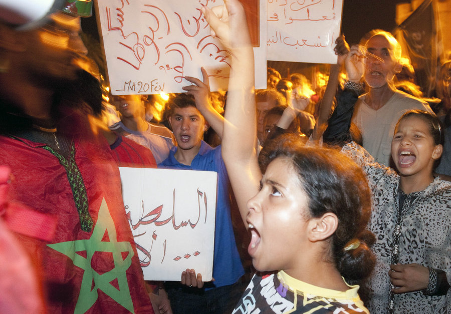 Rights groups, trade unionists and members of the February 20 movement protest against the high cost of living and other causes of social discontent in Rabat on 11 August AFP PHOTO / FADEL SENNA