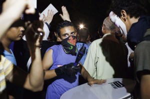 Protester beats a drum during an anti-Syrian regime demonstration outside the Syrian embassy in Cairo AFP PHOTO/GIANLUIGI GUERCIA