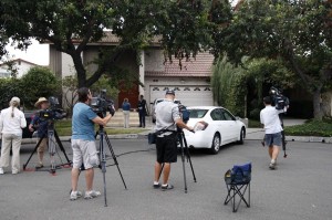 Reporters gather outside the house of a man thought to be associated with the production of the anti-Muslim movie, "Innocence of Muslims" in Cerritos, California. AFP PHOTO/ DAVID MCNEW