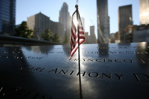 US flag stands at memorial of the north tower during observances on the eleventh anniversary of the attacks on the World Trade Center in New York AFP PHOTO/CHRIS PEDOTA / POOL
