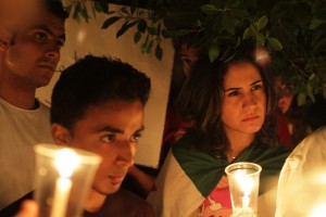 Supporters of the Syrian women’s hunger strike outside the Arab League in central Cairo hold candles for those who have died in Syria Rachel Adams