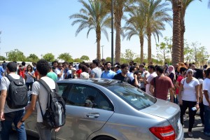 AUC students close the campus gates during a protest on 16 September Wajih Fakhouri / The Caravan