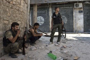 Rebels converge during heavy clashes with Syrian government forces in the neighbourhood of Jdeide, in the city of Aleppo on 24 September AFP PHOTO / MIGUEL MEDINA