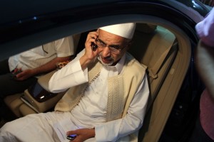 Mohamed al-Megaryef speaks on his mobile phone ahead of visiting wounded Libyan security forces member at the Benghazi hospital on 14 September AFP PHOTO / ABDULLAH DOMA
