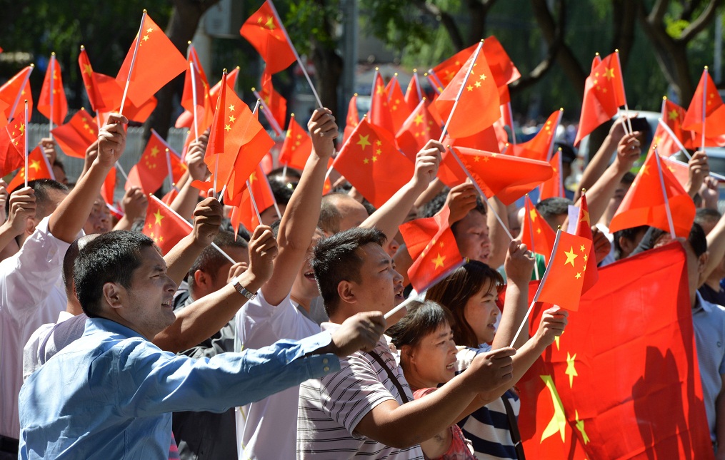 Chinese protester gestures as he marches during an anti-Japanese protest over the Diaoyu islands issue, known as the Senkaku islands in Japanese, outside the Japanese Embassy in Beijing AFP PHOTO / GOH CHAI HIN