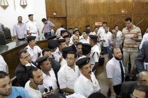 Police officer monitor proceedings in an Egyptian Court (File photo) Mohamed Omar