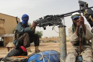 Islamist fighters stand guard near Gao airport AFP/File, Romaric Ollo Hien
