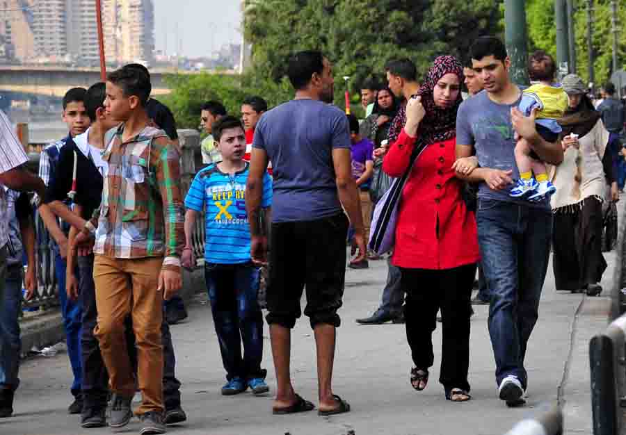 People take a walk on the Nile Cornice during celebrations for Eid Al-Adha (Photo by Hassan Ibrahim)