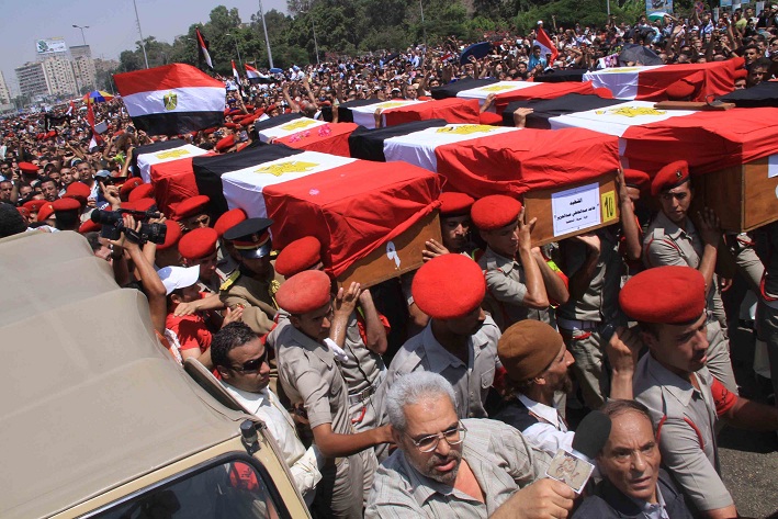 Funeral takes place in Cairo for the soldiers killed by gunmen near the border with Israel at Rafah. After this attack Morsy sacked several head figures in North Sinai and retired Hussein Tantawi, defence minister at the time Mohamed Omar