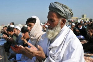 Afghan devotees take part in Eid al-Adha morning prayers at a mosque in Jalalabad AFP / Noorullah Shirzada