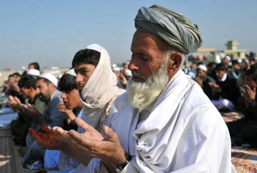 Afghan devotees take part in Eid al-Adha morning prayers at a mosque in Jalalabad AFP / Noorullah Shirzada