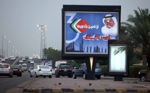 A defaced billboard for a candidate in the upcoming Kuwaiti parliamentary elections is seen at the side of a main road in Kuwait City. (AFP Photo / Yasser Al-Zayyat)