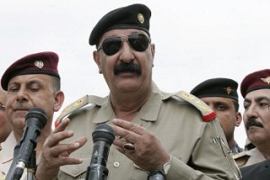The head of the army's 12th division and the Tigris Operations Command, Lieutenant General Abdulamir al-Zaidi, adresses troops in the northern Iraqi city of Kirkuk. (AFP PHOTO / Marwan Ibrahim)
