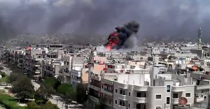 Heavy explosions could be frequently heard in Aleppo and Damascus while warplanes and helicopters flew over the city. ( AFP PHOTO / YOUTUBE)