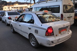 The white cab, introduced to the streets of Cairo after 2009. (DNE/ Hassan Ibrahim)