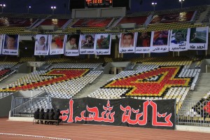 Photos of those killed in the Port Said stadium disaster hang inside Alexandriaâs Borg El-Arab stadium at the start of an El-Ahly match Mohamed Hamza