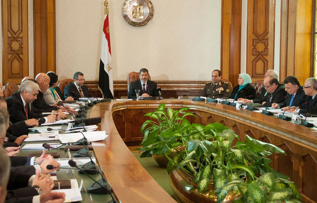 Morsi’s presidential team, which was launched as composing of “different colours of the political spectrum,” is now formed by five Islamist advisors, Only Emad Abdullah, a police general, is considered independent. (File Photo) (AFP\Photo)