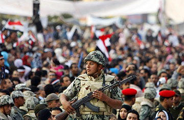 People in three different governorates have adopted the idea of giving signatures to notaries to demand that the army runs the nation. (AFP Photo)