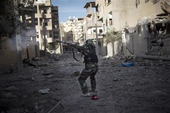 The new battle for Baba Amr began as jihadist fighters in the oil-producing east said they had established religious committees to administer the area's policing, judiciary and emergency services. (AFP Photo)