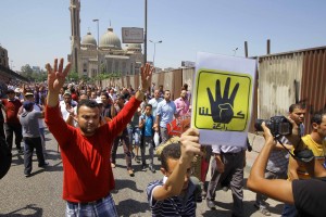 Pro-Morsi demonstrators marched in Cairo on 23 August 2013 (Photo by Mohamed Omar/DNE)