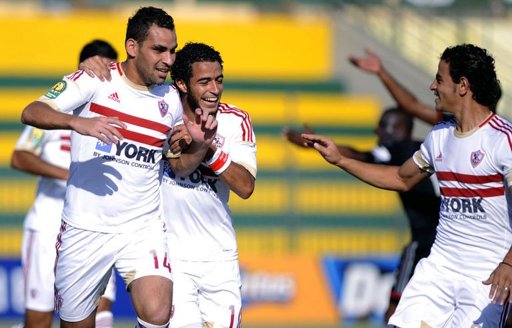 Mohamed Abu Trika holdsthe Agrican Chamipons League Trophy following Al-Ahly win over against South Africa's Orlando Pirates (Ahmed Al-Malky/DNE)
