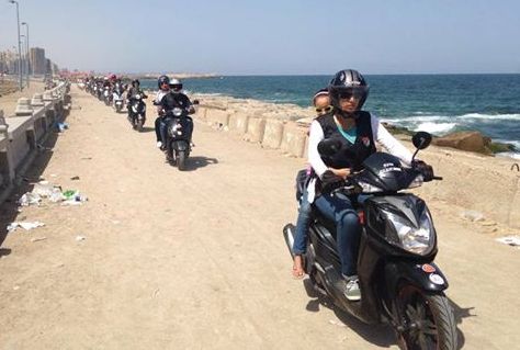 The Alexandria Scooter Riders Club cruises along the coast (Photo Courtesy of Alexandria Scooter Riders Club)