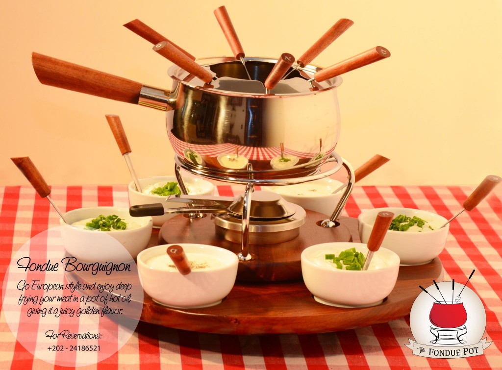 Sample Swiss delicacies in The Fondue Pot Daily News Egypt