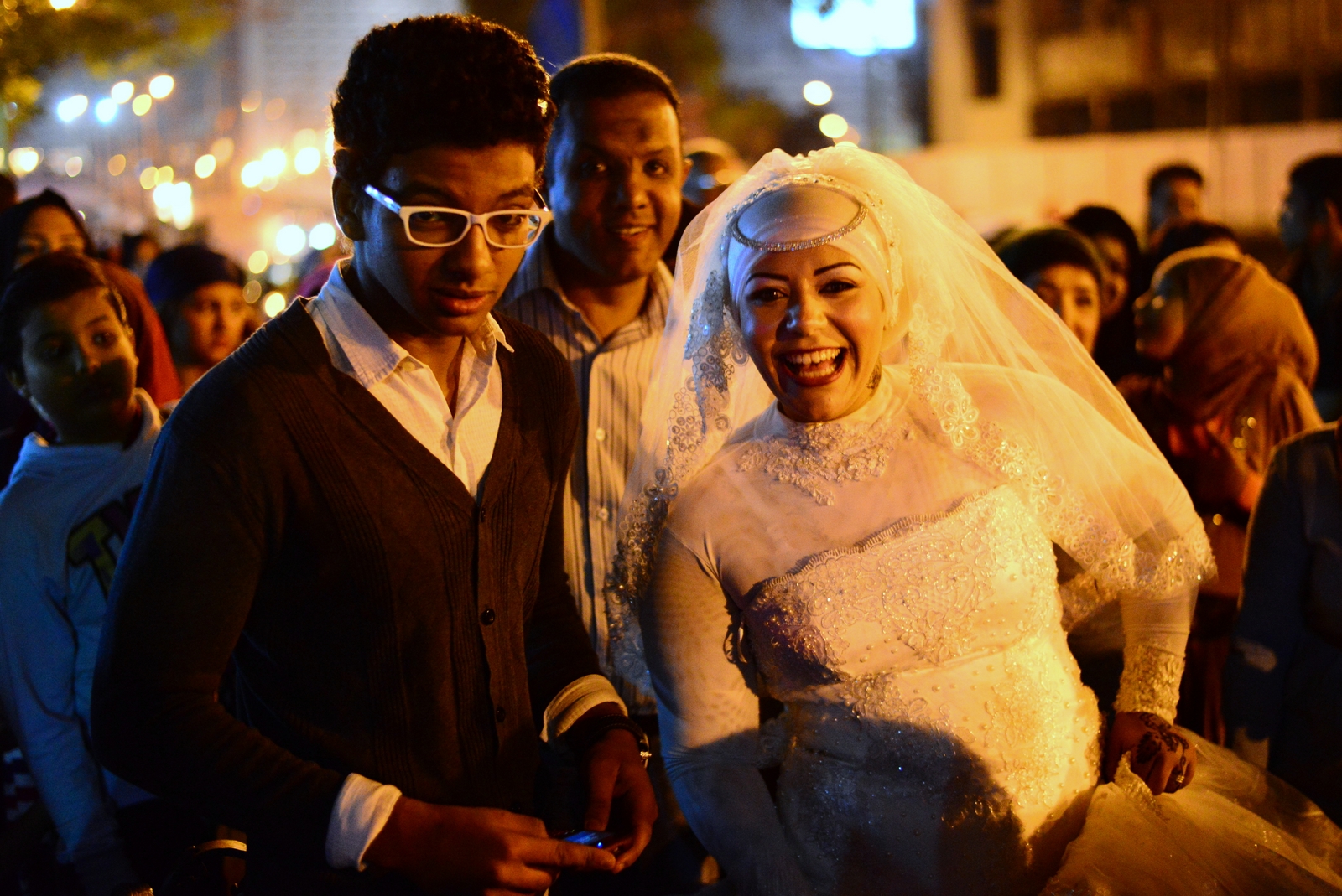 A happy bride, surrounded by friends and family is getting ready for a celebratory trip on the Nile. (Photo by Aaron T. Rose)