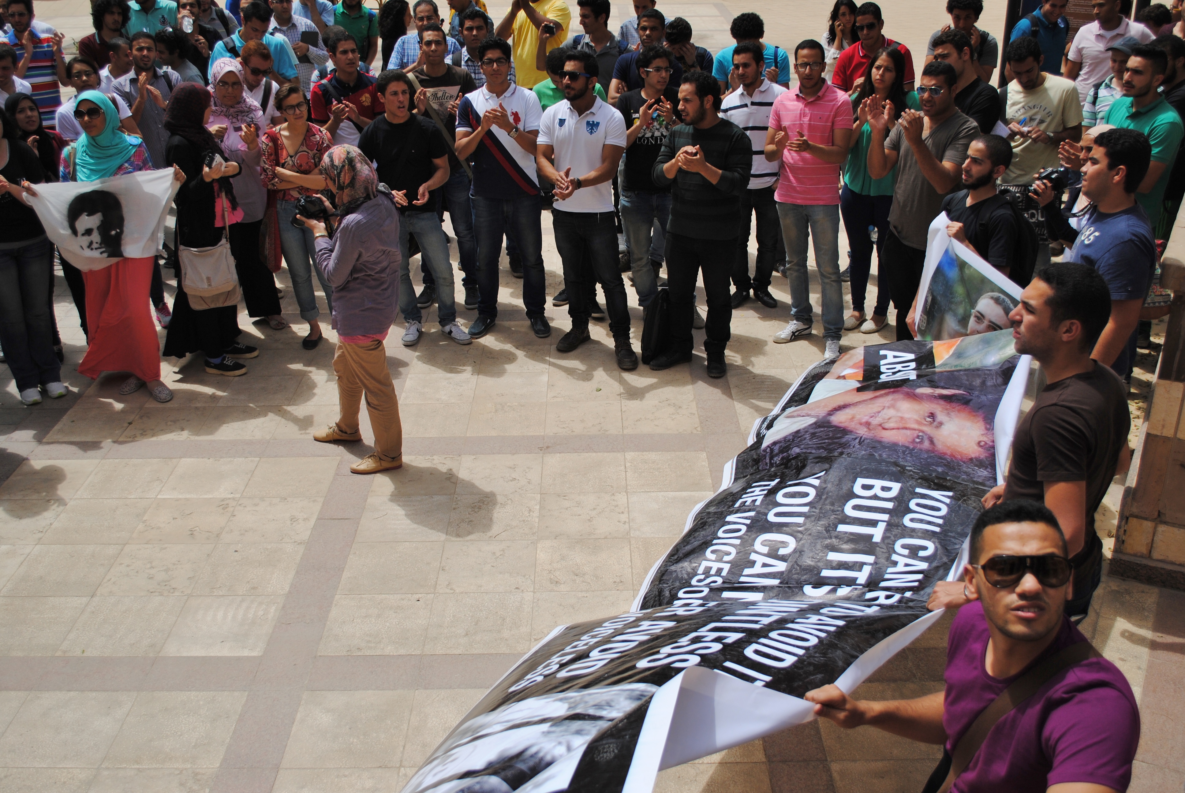 Students at the American University in Cairo (AUC) protest in support of their detained classmates. (Photo by Jihad Abaza)