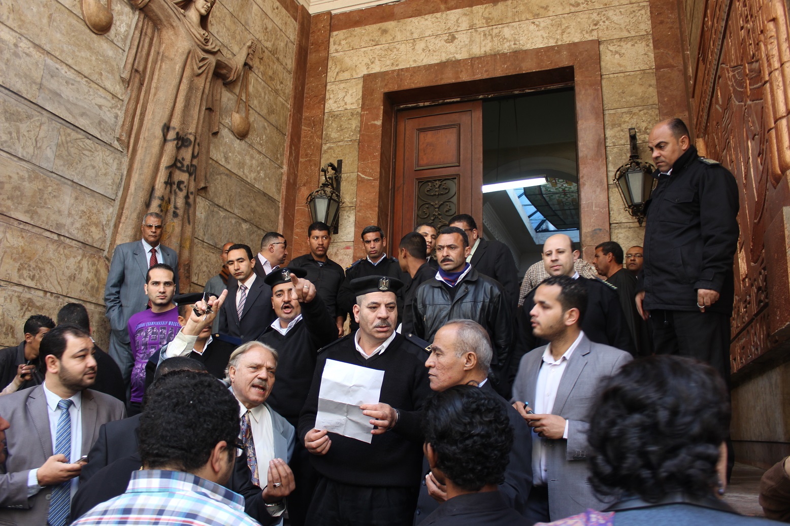 Dozens of journalists and lawyers gathered Saturday morning in front of the Abdeen Court, Downtown Cairo, ahead of the first trial session in the controversial killingcaseof Shaimaa Al-Sabbagh. (Photo By Emir Nader)