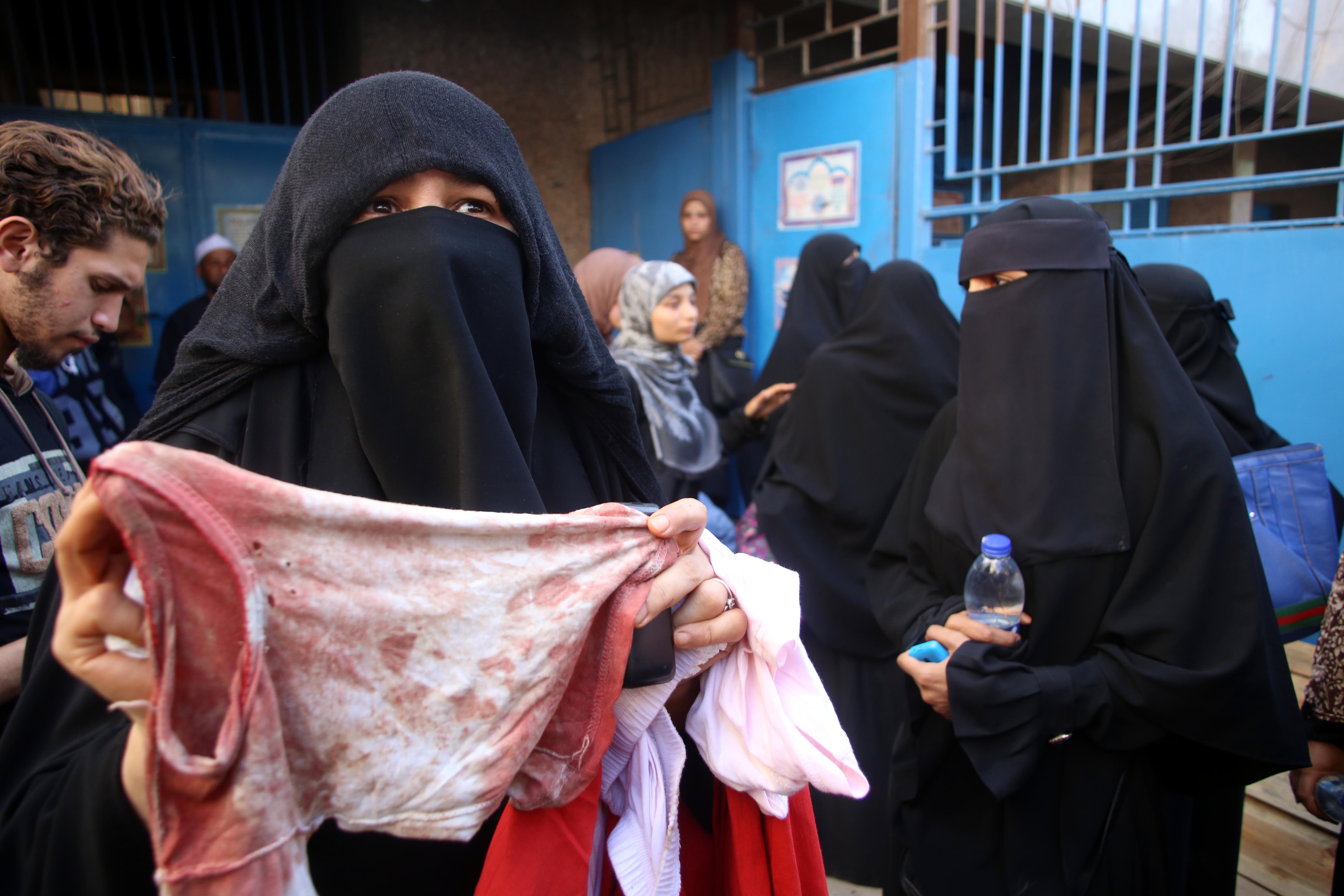 Some of the families broke down, while others celebrated acknowledging that their dead relatives are martyrs. Dressed in black, female relatives screamed as the bodies were transferred in trucks. (Photo Handout to DNE)