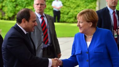 Egypt's President Abdel Fattah Al-Sisi with German Chancellor Angela Merkel