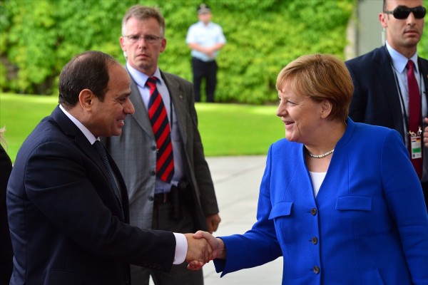 Egypt's President Abdel Fattah Al-Sisi with German Chancellor Angela Merkel
