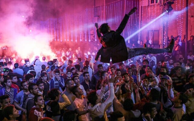 Youth youth dance to Mahraganat music at a local wedding in Egypt
