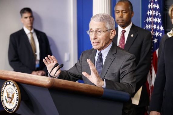 Anthony Fauci (front), director of the U.S. National Institute of Allergy and Infectious Diseases (NIAID), speaks during a press conference on the coronavirus (Photo by Ting Shen/Xinhua) COVId-19 vaccine