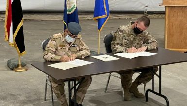 U.S.-led coalition hands over military base near Baghdad to Iraqi forces