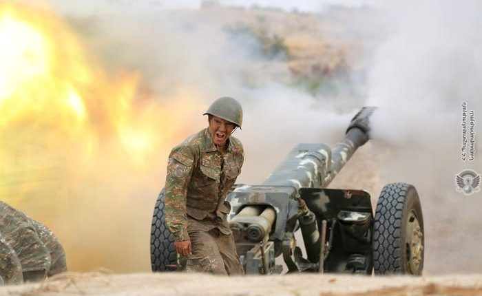 An ethnic Armenian soldier fires an artillery piece during fighting with Azerbaijan's forces in the breakaway region of Nagorno-Karabakh, September 29, 2020. Armenia Defense Ministry/Handout via REUTERS