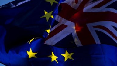 File photo taken on Oct. 19, 2019 shows the European Union flag and the Union Jack flag outside the Houses of Parliament in London, Britain. Brexit (Xinhua/Han Yan)