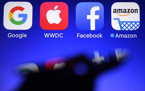 EU unveils landmark law curbing power of tech giants