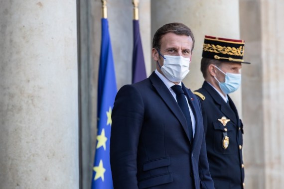 French President Emmanuel Macron (L) appearing ahead of the third Paris Peace Forum at the Elysee Palace in Paris, France. (Photo by Aurelien Morissard-Xinhua)