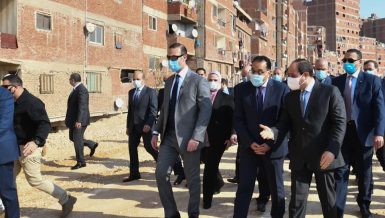 Egyptian president and Egypt's prime Minister inspection tour of the Ezbet El Haggana slum area in Cairo