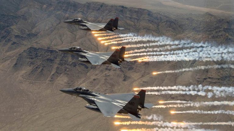 The US airstrikes in eastern Syria have killed at least 22 pro-Iran fighters before daybreak Friday, according to a war monitor.