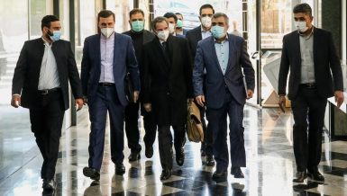IAEA Chief held talks with Iran's atomic energy chief and foreign minister, reaching an agreement for 3-month "essential" nuclear verification